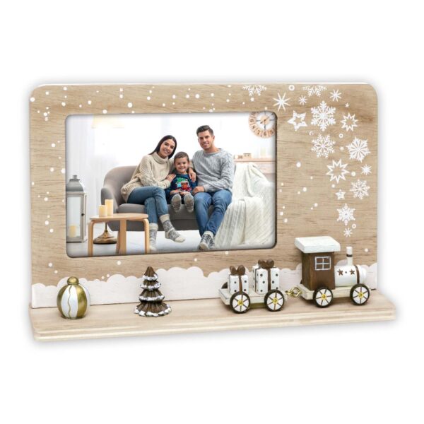 marco de navidad en tonos de color beig y detalles de tren nevado